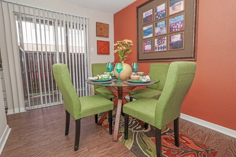 Model dining room next to the patio doors at Magnolia apartments in Shreveport, LA